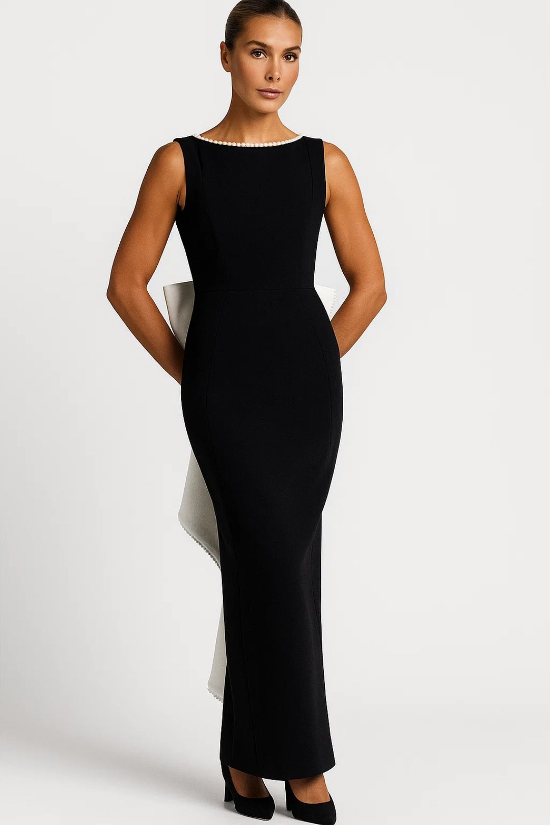 Elegant long dress with decorated neckline and back bow | Sophisticated ceremony style
