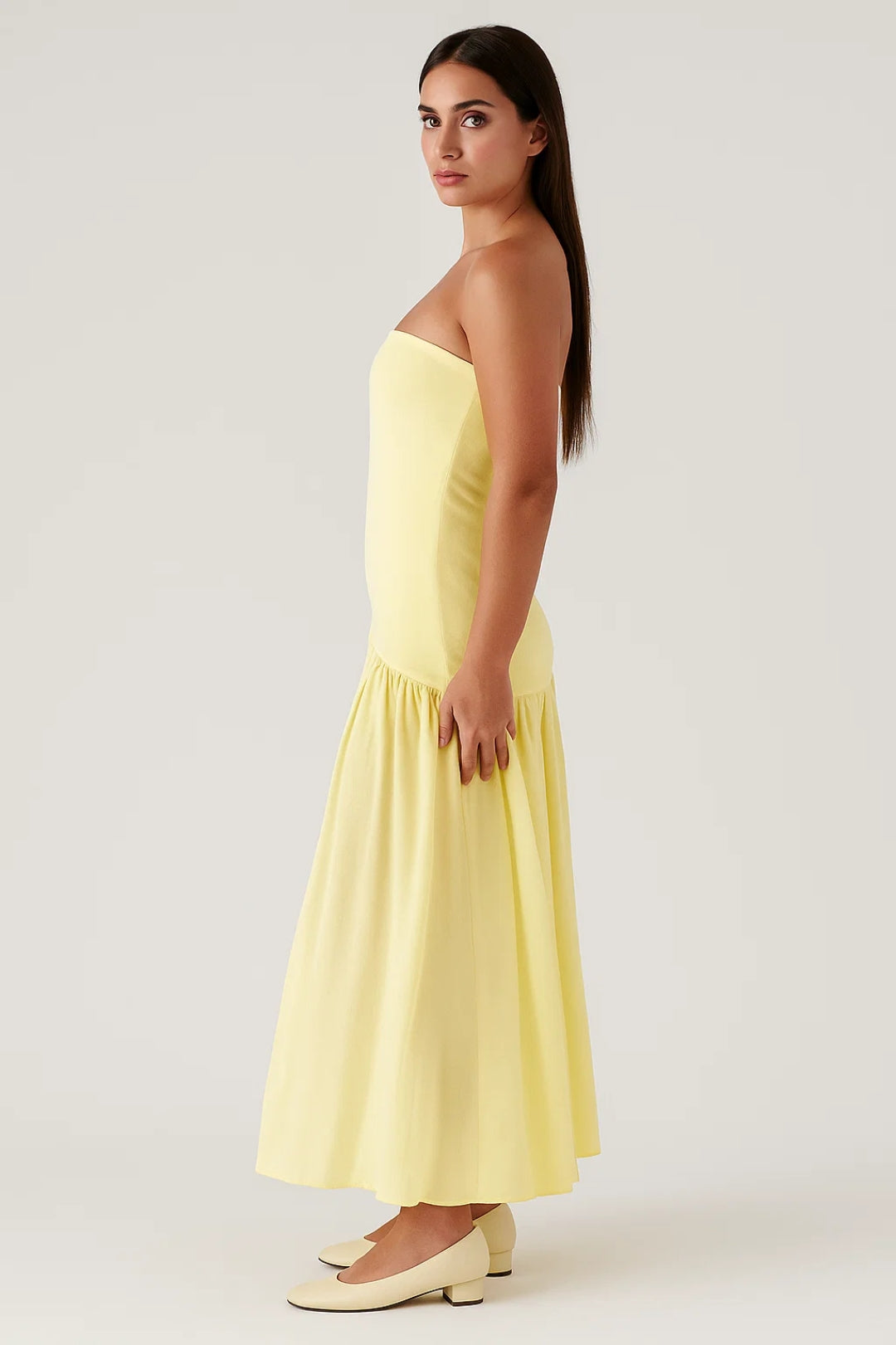 Long strapless bandeau dress | Flared ruffled skirt | Minimal summer look
