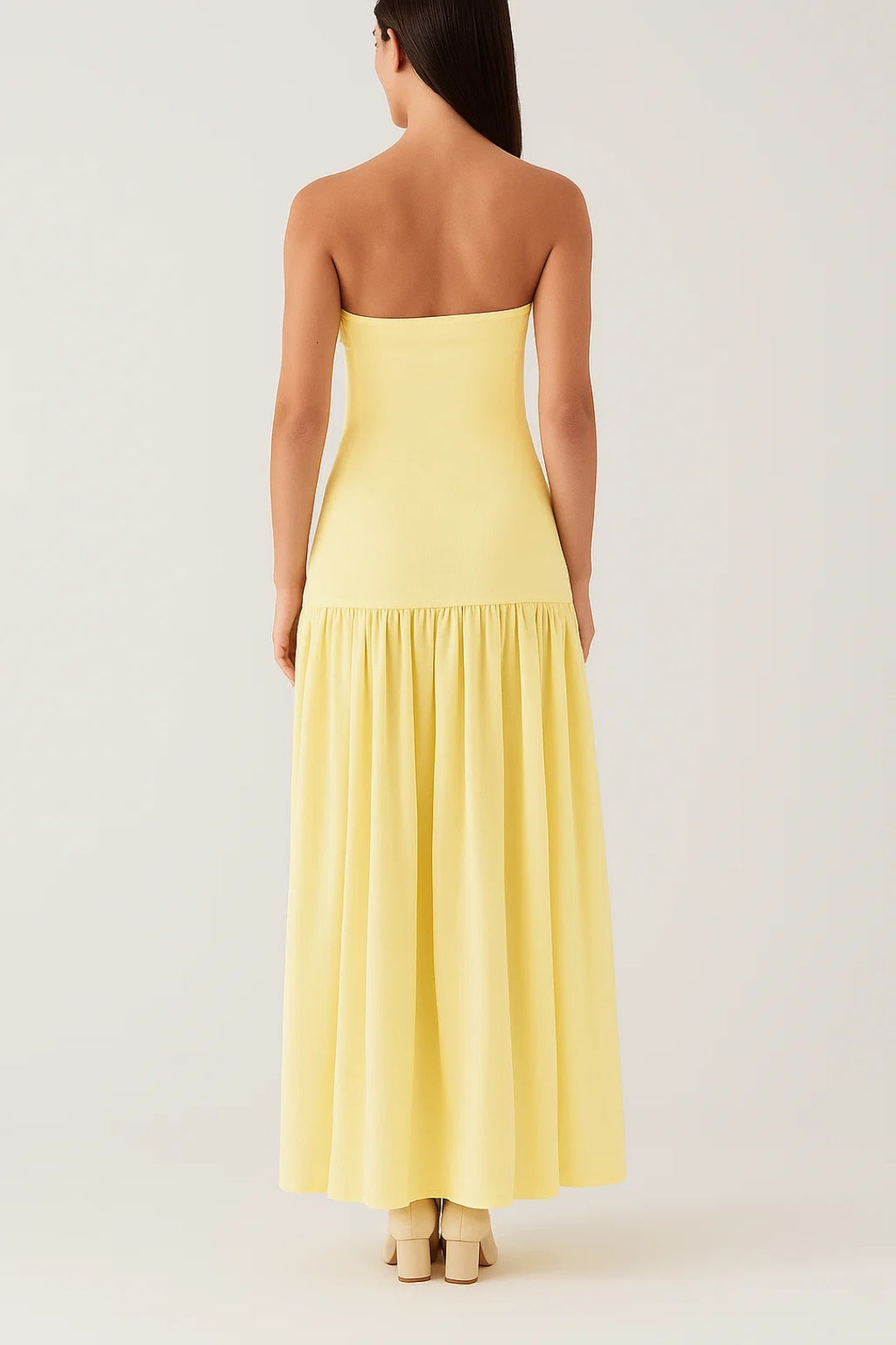 Long strapless bandeau dress | Flared ruffled skirt | Minimal summer look