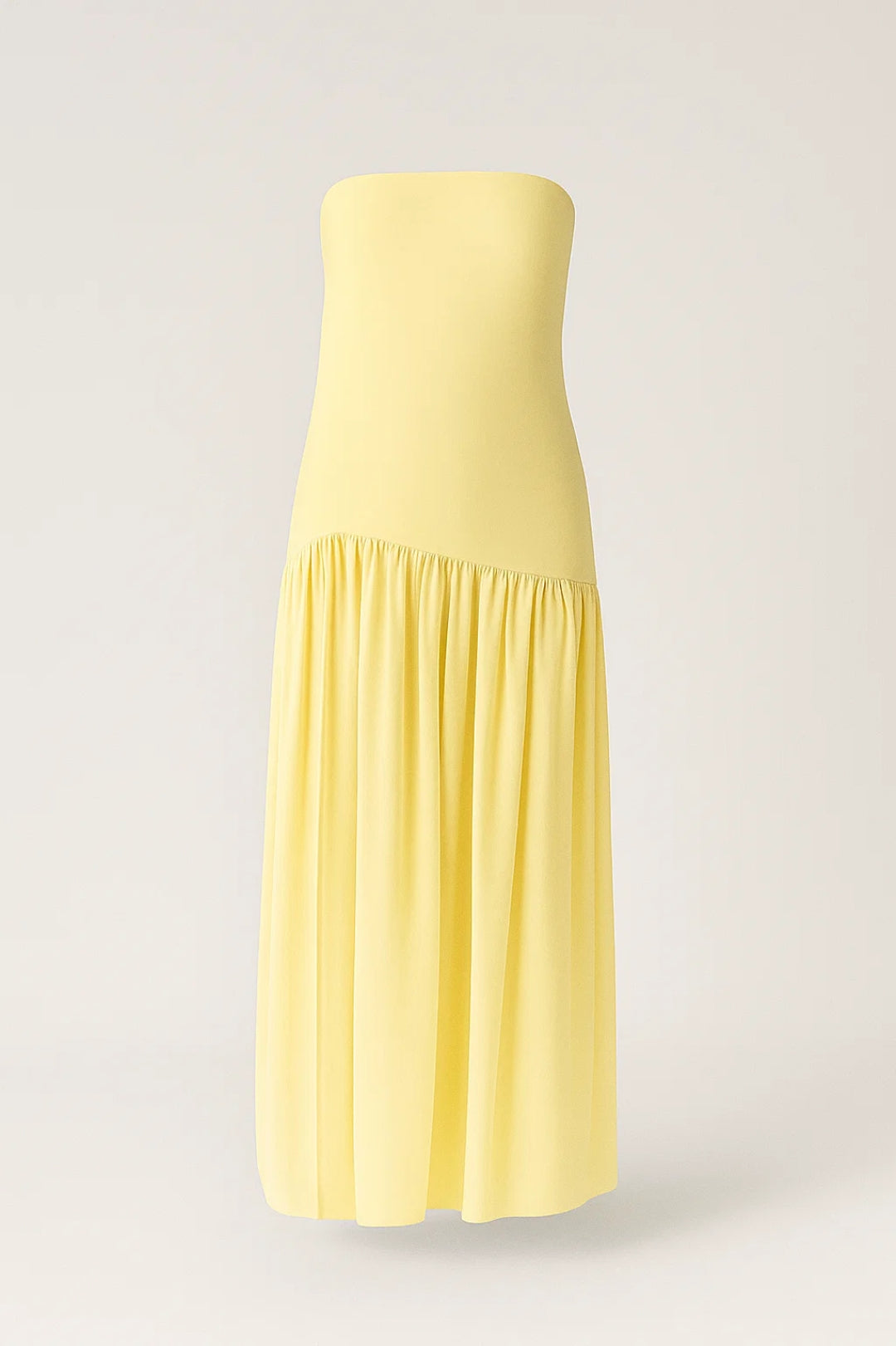 Long strapless bandeau dress | Flared ruffled skirt | Minimal summer look