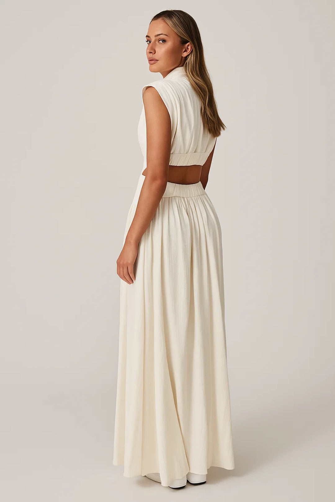 Long dress with high collar and side cut-outs | Sleeveless