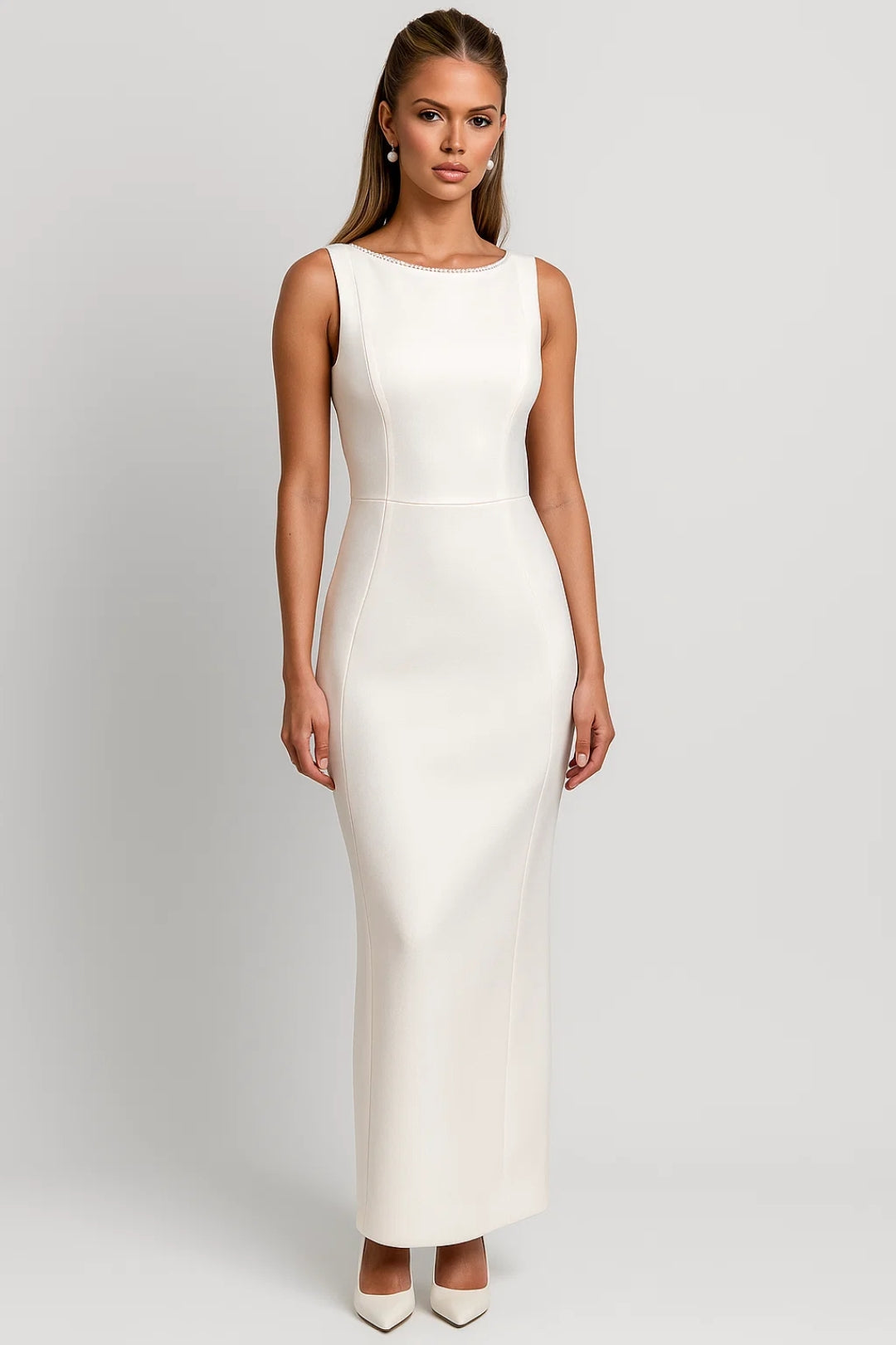 Elegant long dress with decorated neckline and back bow | Sophisticated ceremony style